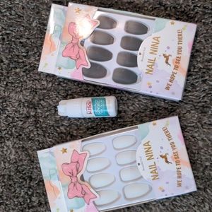 Brand new set of white and black coffin tip glue on nails